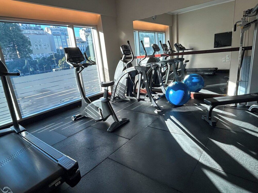 Gym with treadmills and elliptical machines at Eurobuilding Hotel Boutique