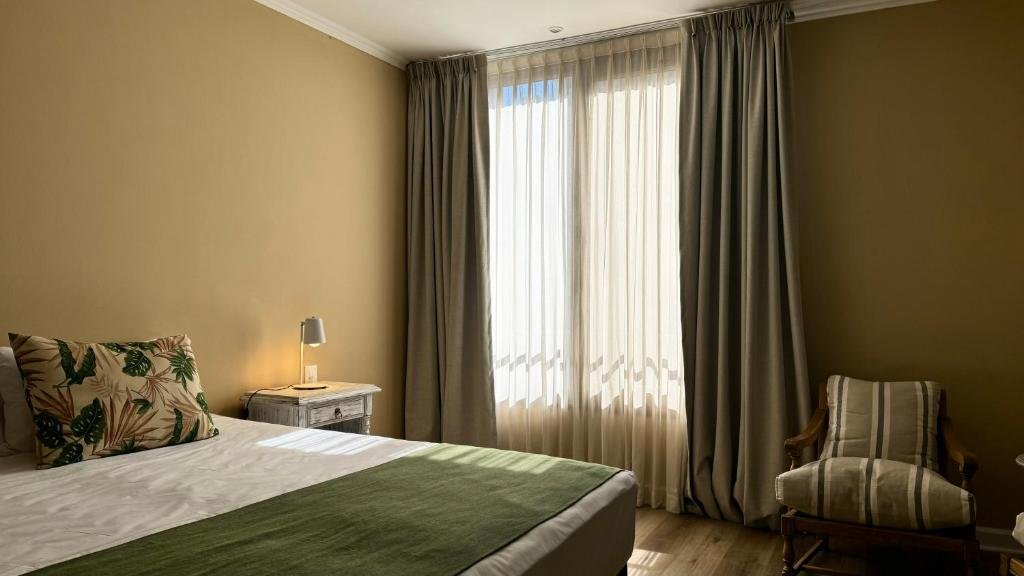 Zimmer und Ausstattung im Gardi Hotel & Suites im Stadtzentrum