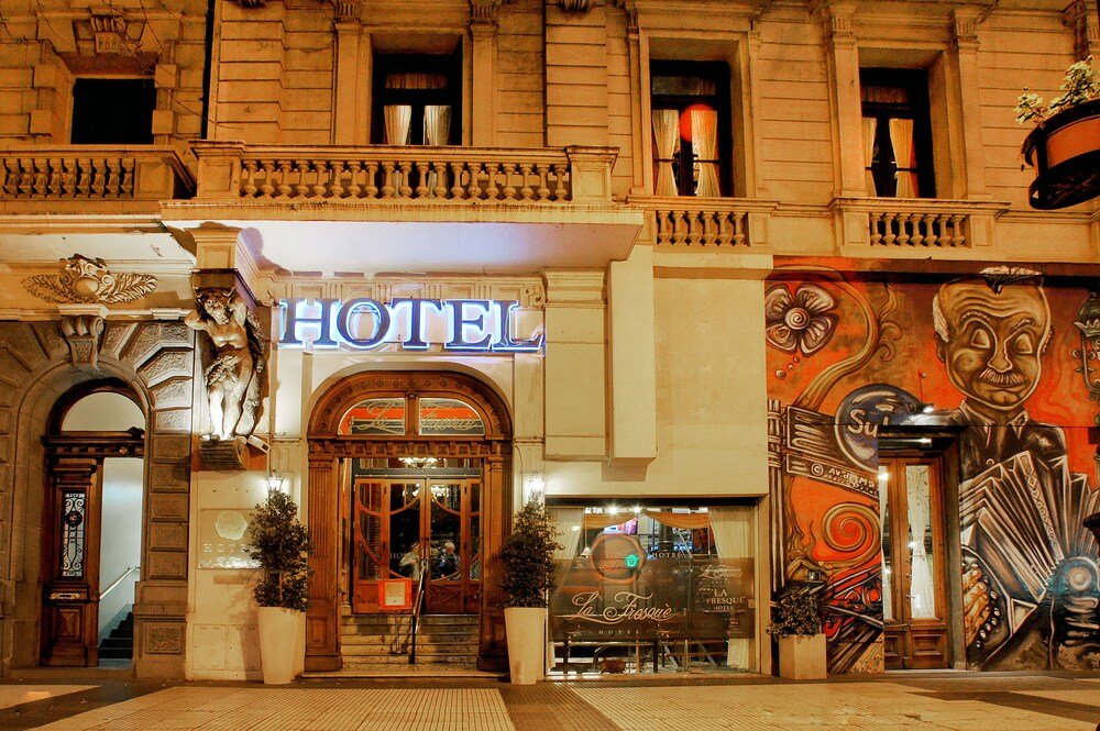 Hotel facade with a prominent neon sign