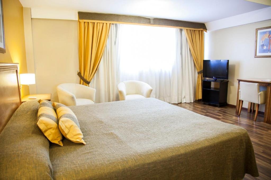 Gästezimmer im Tritone Hotel